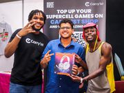 Dominion Eromosele and Bena Wa Malines with a gamer at Naiccon