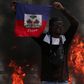 A demonstrator holds up a Haitian flag during protests demanding the resignation of Prime Minister Ariel Henry in Port-au-Prince, Haiti, March 1, 2024 [AP}