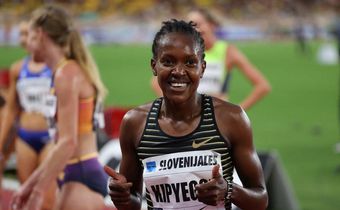 Kenya's Faith Kipyegon reacts after winning the 1500m Women event at the Wanda Diamond League athletics meeting at the Louis II Stadium in Monaco on August 10, 2022. (Photo by VALERY HACHE/AFP via Getty Images)