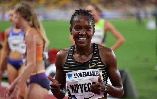 Kenya's Faith Kipyegon reacts after winning the 1500m Women event at the Wanda Diamond League athletics meeting at the Louis II Stadium in Monaco on August 10, 2022. (Photo by VALERY HACHE/AFP via Getty Images)