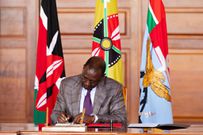 President William Ruto signs a bill at State House, Nairobi on June 28, 2024
