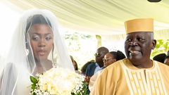Singer Akothee & her father on her wedding day