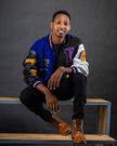 Israel Mbonyi in a Lakers jacket, the Rwandan gospel artiste is an avid reader and basketball fan