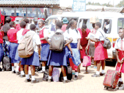 Students prepare to board a matatu