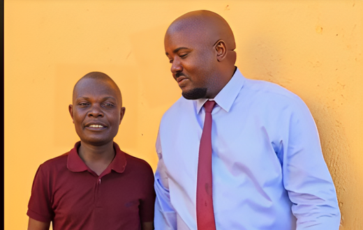 Leonard Omusula (left) and MP Tindi Mwale