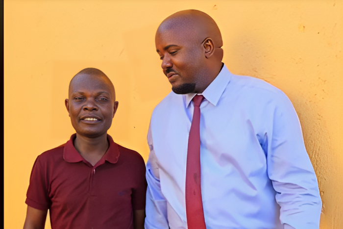 Leonard Omusula (left) and MP Tindi Mwale