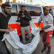 The body of a victim killed in an Israeli bombardment is taken out of an ambulance in Gaza City.DAWOOD NEMER/AFP via Getty Images