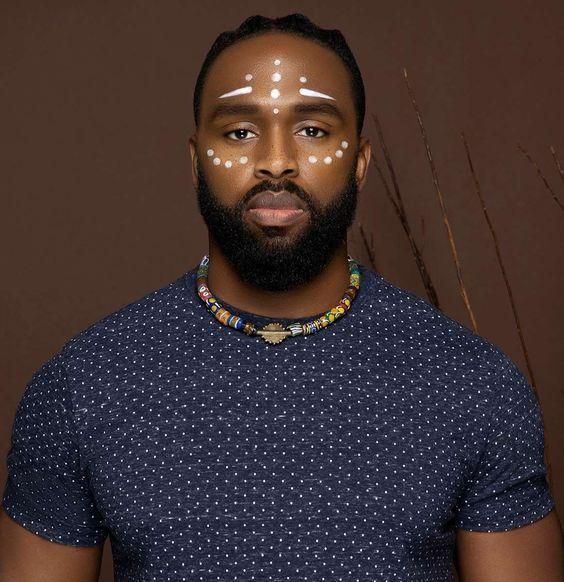 Man wearing African accessory/Courtesy/Cloth and Cord