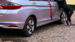 Food Content creator Sue Owino unveils her first car, a gift from her husband