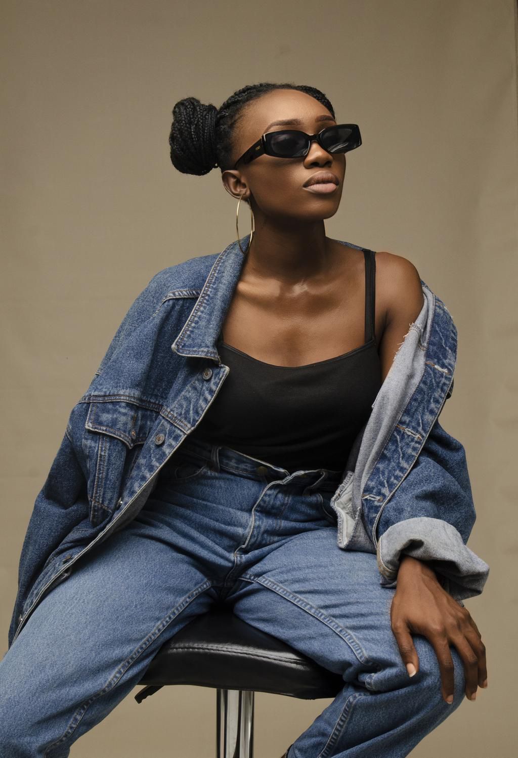 Stylish woman in a trendy outfit and sunglasses