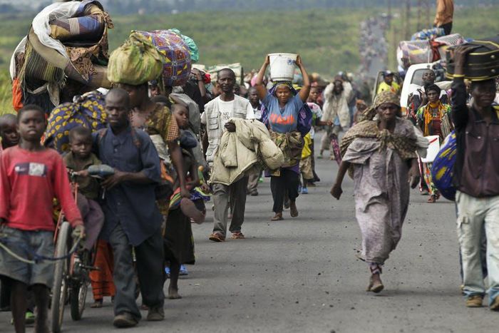 Refugees fleeing the DRC during fighting between rebels and government troops