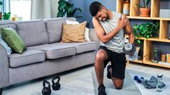 Man experiencing post work out pain