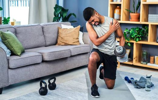 Man experiencing post work out pain