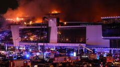 A giant blaze is seen over Crocus City Hall in Moscow after several gunmen burst into a concert hall and fired at the crowd on Friday, March 22, 2024 [Courtesy]