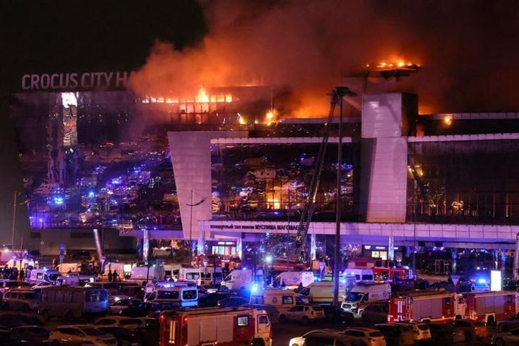 A giant blaze is seen over Crocus City Hall in Moscow after several gunmen burst into a concert hall and fired at the crowd on Friday, March 22, 2024 [Courtesy]