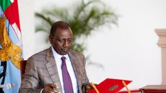 President William Ruto signs a bill at State House, Nairobi on June 28, 2024