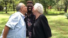 Edwin Chiloba with his adoptive parents Peter and Donna Pfaltzgraff