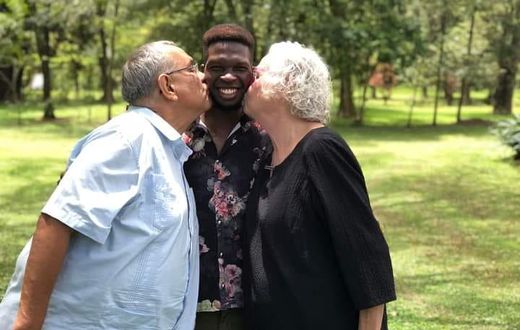 Edwin Chiloba with his adoptive parents Peter and Donna Pfaltzgraff