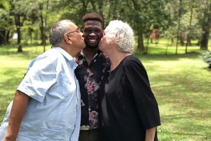 Edwin Chiloba with his adoptive parents Peter and Donna Pfaltzgraff