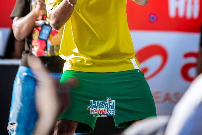 WCB signeeMbosso performing at the Wasafi Festival in Mwanza on August 12