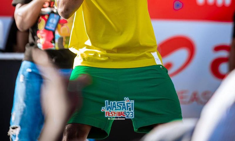 WCB signeeMbosso performing at the Wasafi Festival in Mwanza on August 12