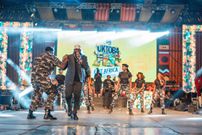 Khaligraph and Breeder LW on stage at OktobaFest