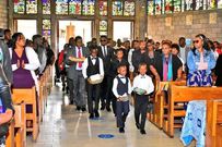 Sports CS Ababu Namwamba and his family at Consolata Shrine during the requiem mass of Prisca Mwaro