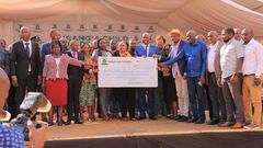 CS Machogu and other leaders during the Murang'a bursary awarding ceremony