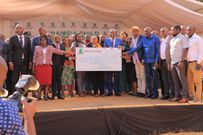 CS Machogu and other leaders during the Murang'a bursary awarding ceremony