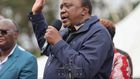 President Uhuru Kenyatta addresses a roadside gathering on August 6, 2022 after a one-day working tour of the Central region where he inspected and commissioned several development projects in Murang'a and Nyeri counties