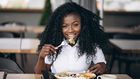 Lady eating food for good mood