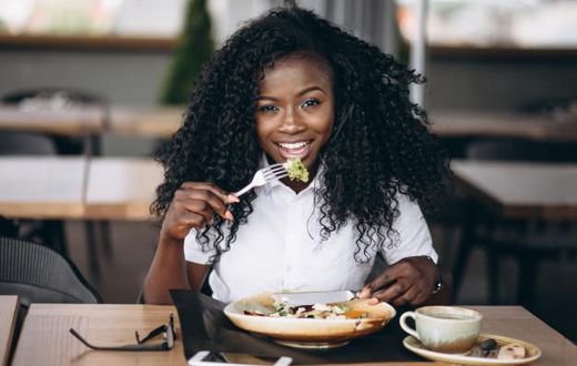 Lady eating food for good mood