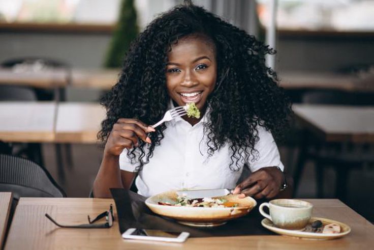 Lady eating food for good mood