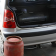 A car fitted with cooking gas cylinder