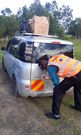 A traffic officer inspecting a vehicle