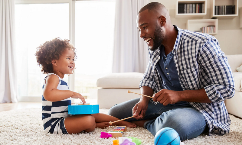 A father and daughter having fun together