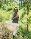 Charlene Ruto holding a bee hive