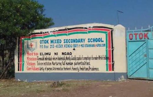 Image of Otok Secondary School main gate.