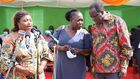 Former Kakamega governor Wycliffe Oparanya with his two wives Carolyn and Priscilla Oparanya