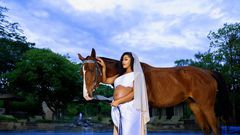 Amber Ray poses for aphoto