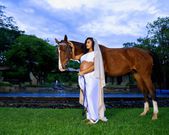 Amber Ray poses for aphoto