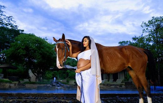 Amber Ray poses for aphoto