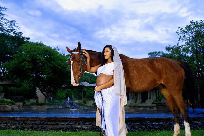 Amber Ray poses for aphoto