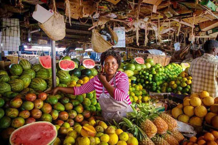 An Informal greengrocer popularly known as Mama Mboga selling her vegetables.