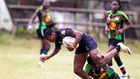 Mwamba's Terry Ayesa (centre) and Janet Okello (left) charge past Top Fry Nakuru Ann Akinyi during the Kenya Cup Women league match played at Impala Club on November 27, 2021. Photo/CHRIS OMOLLO