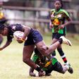 Mwamba's Terry Ayesa (centre) and Janet Okello (left) charge past Top Fry Nakuru Ann Akinyi during the Kenya Cup Women league match played at Impala Club on November 27, 2021. Photo/CHRIS OMOLLO