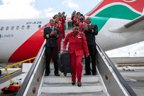 Alice Waweru alights from a KQ plane on her last day of working after serving the company for 38 years.