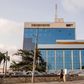 Pedestrians walk in front of Ghana's central bank building in Accra, Ghana, November 16, 2015.   REUTERS/Francis Kokoroko