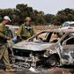 Israel soldiers inspect burnt cars at the site of the Hamas terrorist attacks on the Nova music festival in southern Israel.Amir Cohen/Reuters