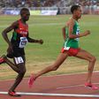 Kenyan Gilbert Kwemoi (Left) and Ethiopian Bekele Ayele Demoz run during the 12th African Juniors Athletics Championships in Addis Ababa, Ethiopia, on March 6, 2015. (Photo by Orhan Karsli/Anadolu Agency/Getty Images)